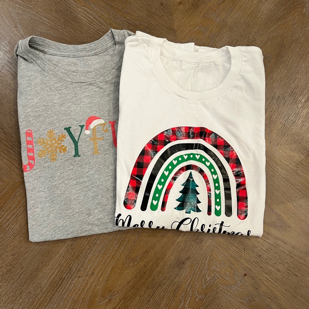 2 Christmas T shirts. Size Medium.